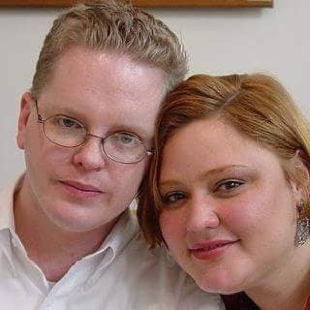 Young Jim and red-haired Faye in a close-up photo in Jackson, Mississippi