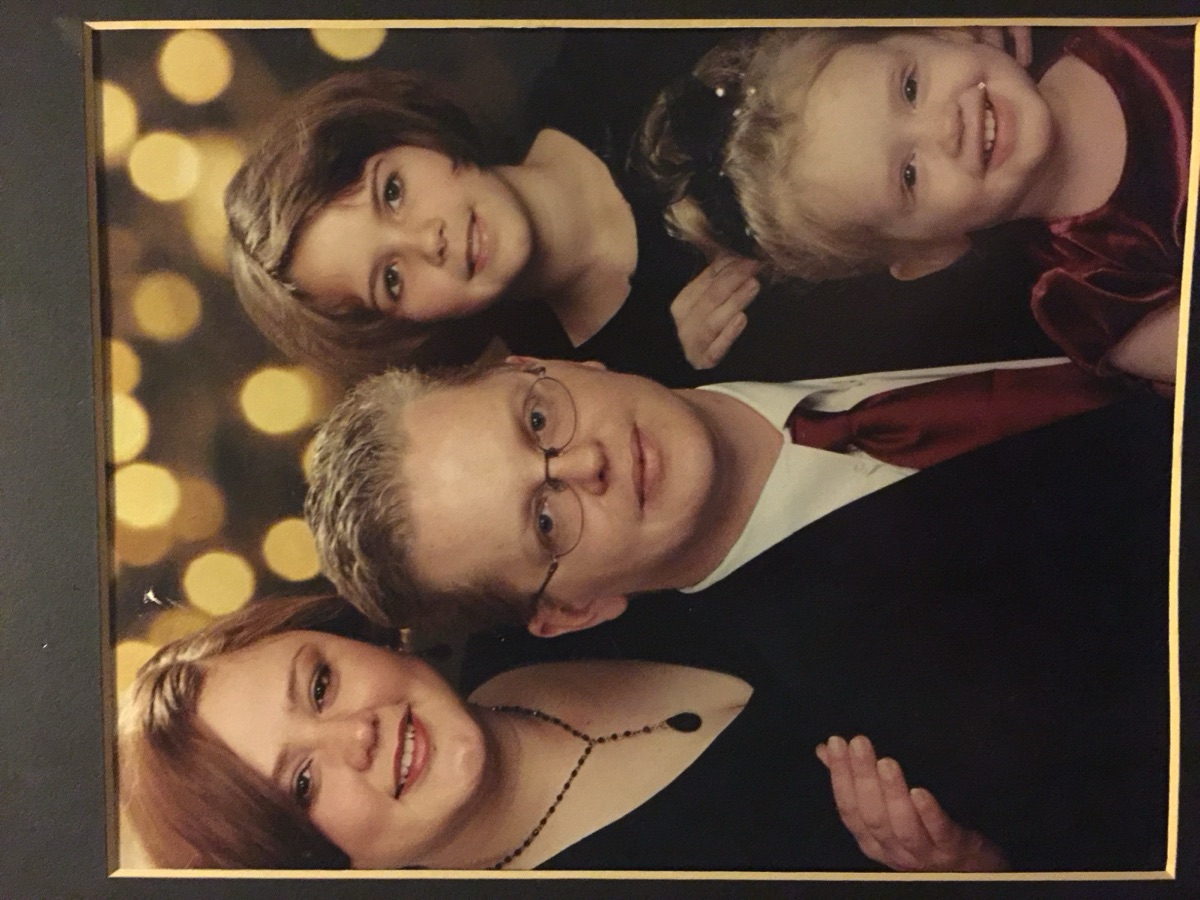 Studio family portrait of Faye and Jim with James and Mia